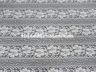 Chiny Delikatny kwiat Striation Spacing Stretch Koronkowa tkanina z nylonowym elastanem materiałem na sukienkę SYD-0173 dostawca