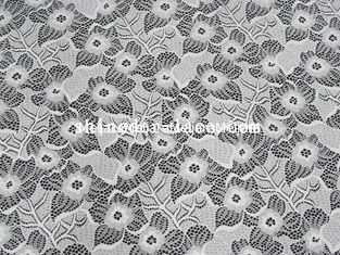 Chiny Biały nylon elastan Stretch Koronkowa tkanina z motywem kwiatowym do odzieży SYD-0186 dostawca